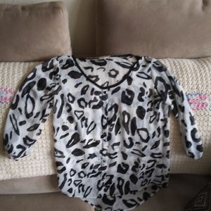 Shear animal print blouse.
